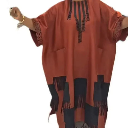 Beautifully designed African dress in plus sizes, highlighting a graceful pullover style with intricate weaving details, ideal for cultural celebrations.