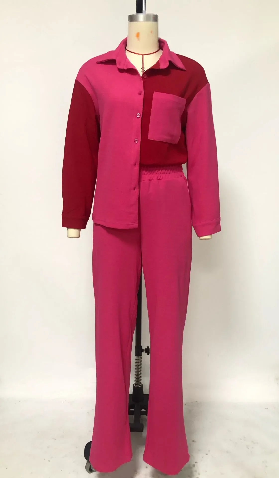 Luxury Women's Tracksuit showcasing the full-length medium stretch pants with high waist for a flattering fit.