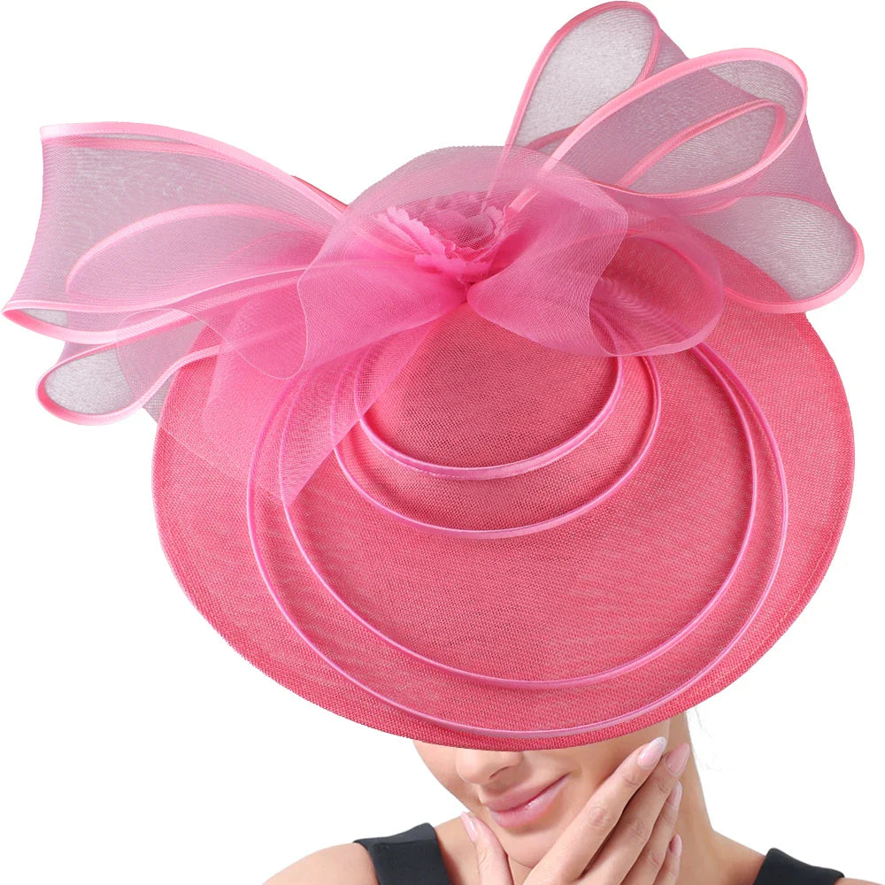 Luxury hand-crafted fascinator hat for women, adorned with vibrant flowers, an exquisite accessory for cocktail events and formal gatherings.