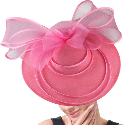 Luxury hand-crafted fascinator hat for women, adorned with vibrant flowers, an exquisite accessory for cocktail events and formal gatherings.