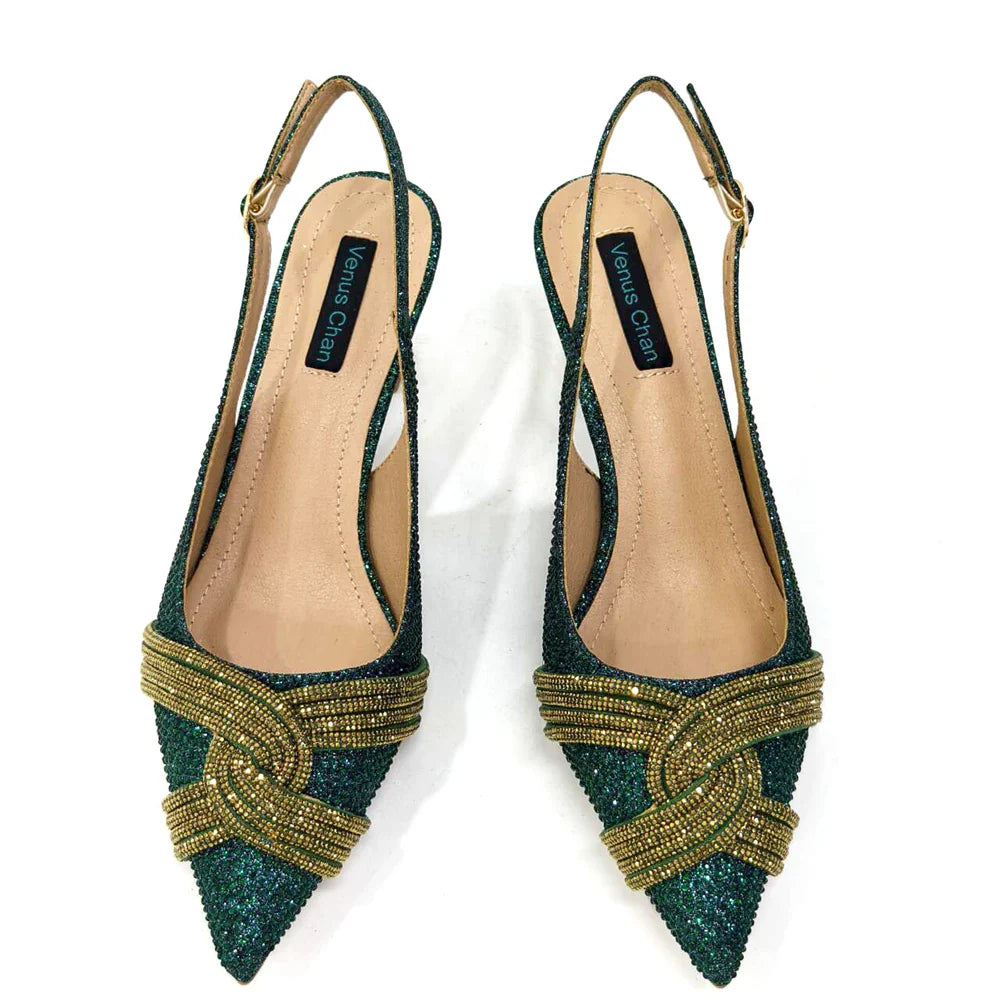 Chic black slingback pumps by Venus Chan, showcasing a stylish butterfly-knot detail, designed for comfort and elegance.