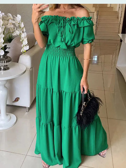 Chic bohemian dress for women, complemented by a natural waistline and short sleeve style, perfect for elegant summer outings.