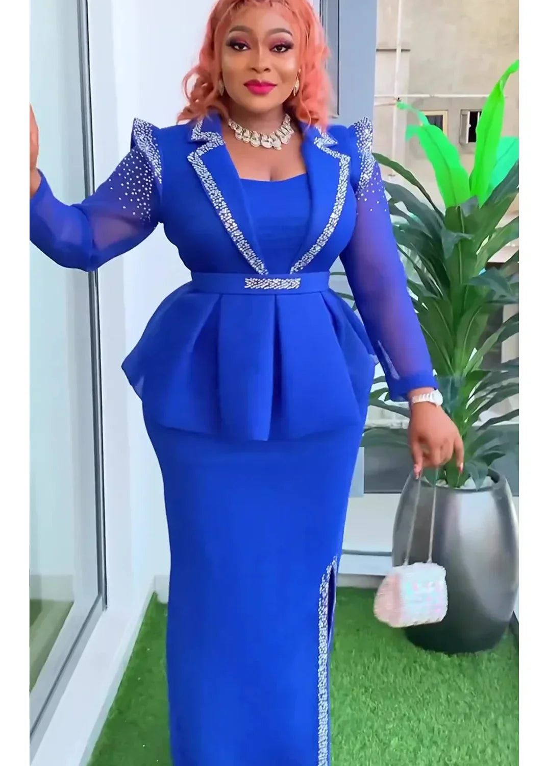 Stunning long Ankara robe designed for plus size women, blending traditional African fashion with modern elegance, perfect for special occasions and celebrations.