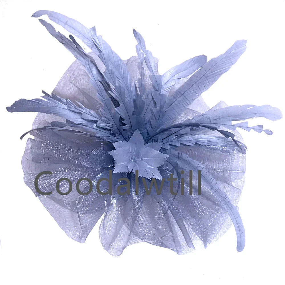 Chic Kentucky Derby fascinator hat designed for women, highlighting intricate feather accents, perfect for luxurious celebrations.