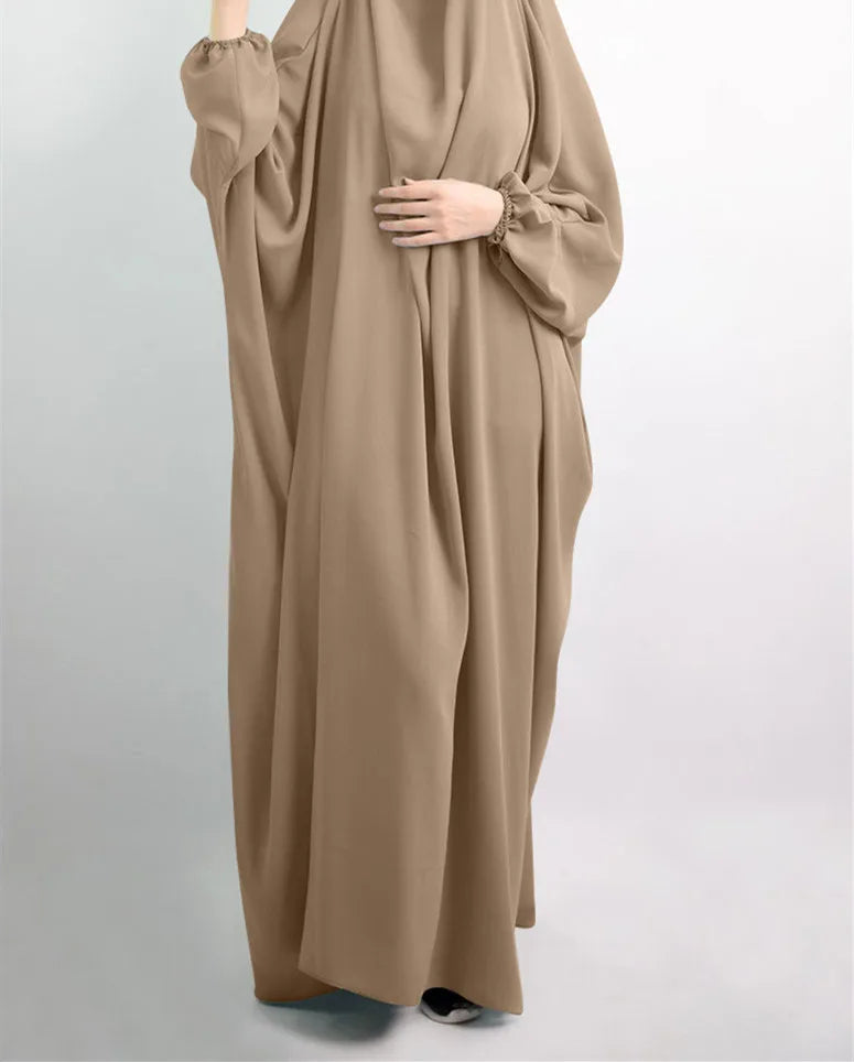 Luxurious one size casual polyester abaya dress with slight stretch, perfect for middle-aged women who appreciate style and comfort.