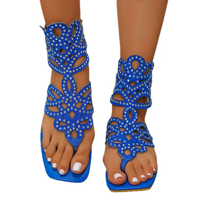 Chamliforve Women's elegant blue and black plus size gladiator flats sandals, perfect for casual beach outings, showcasing a fashionable design and comfortable fit.