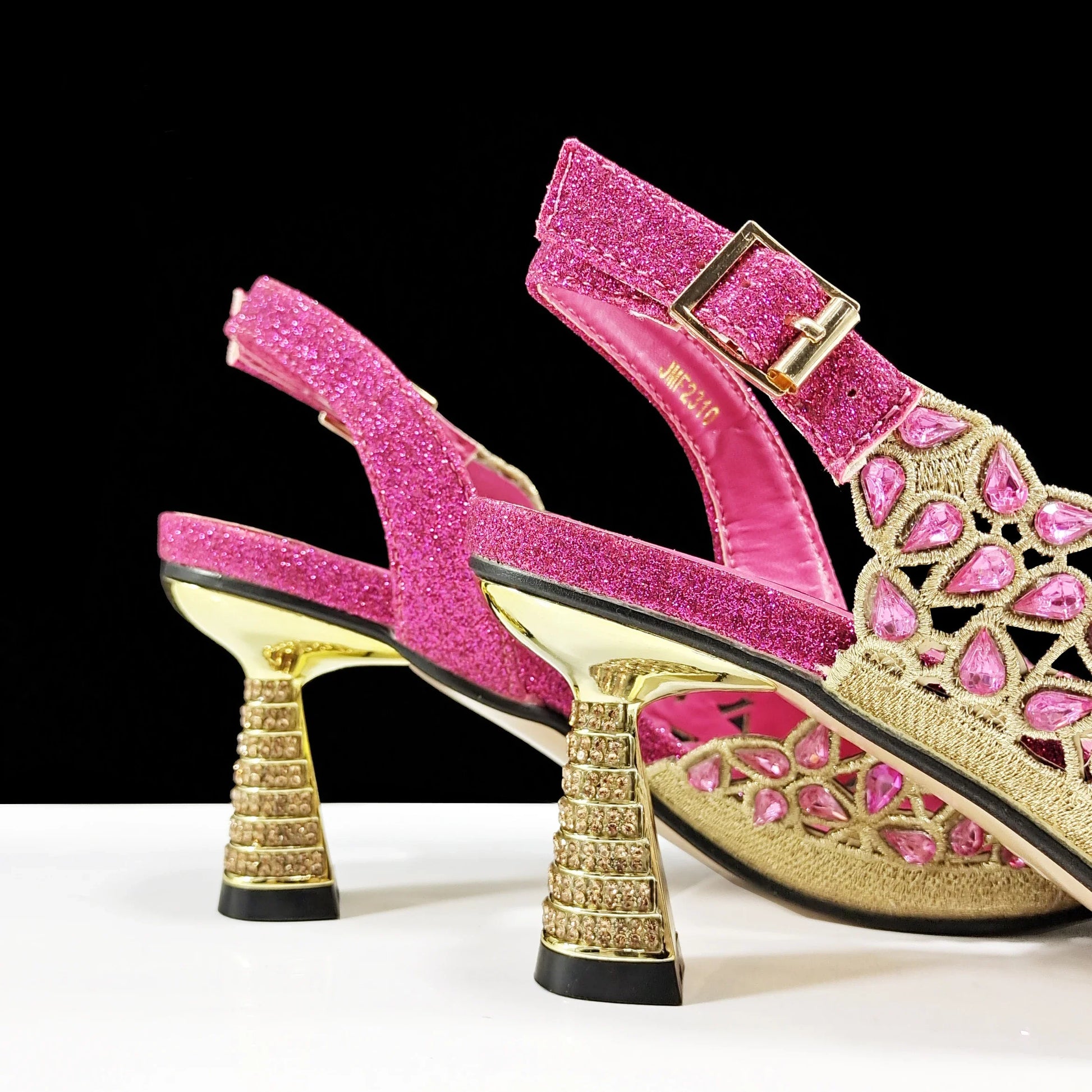 Exquisite pointed toe design of QSGFC fuchsia women's pumps, highlighting the fashionable hollow feature and comfortable fit for true elegance.