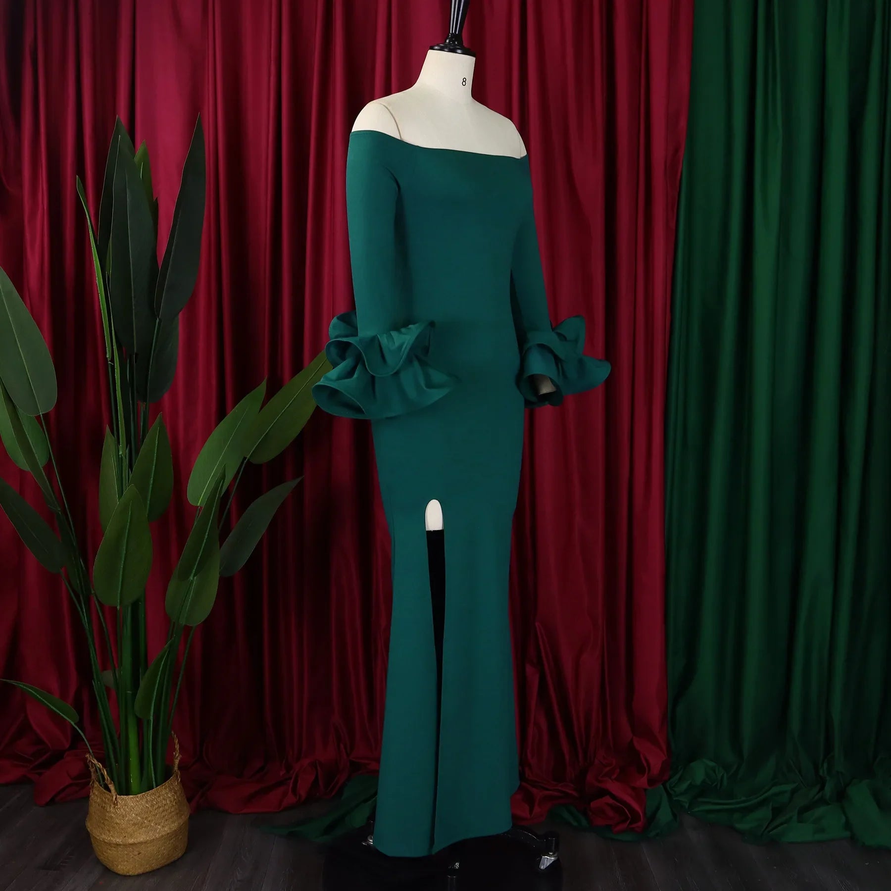 Close-up view of the neckline and sleeve details of the FairyShely Plus Size Off Shoulder Dress, showcasing the sophisticated O-neck design and regular sleeve style.