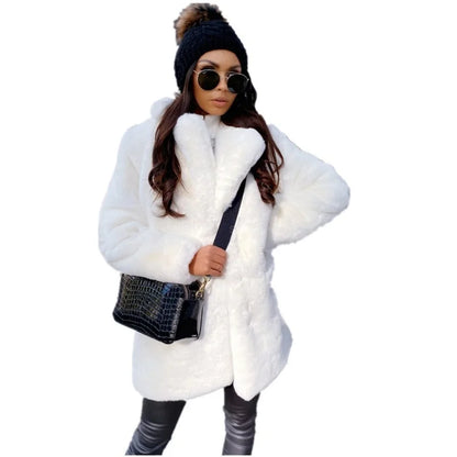 Luxury women's long faux fur coat, demonstrating winter elegance with exquisite detail and crafted from high-quality man-made fibers.