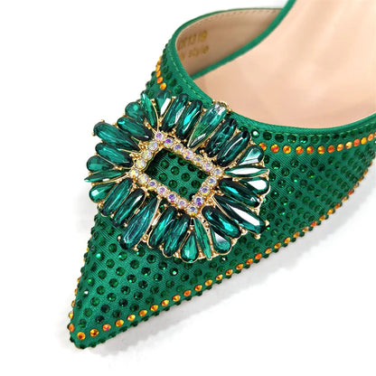 Close-up view of gold-bling embellished women's shoes with matching handbag, embodying elegance and style for parties and weddings.