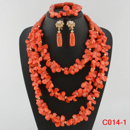 Close-up of luxurious coral bead jewellery set highlighting the fine craftsmanship and classic African design elements.