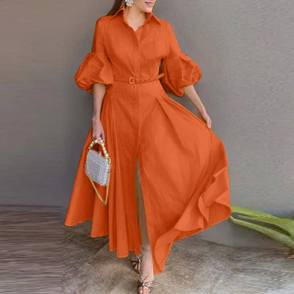 Back view of the VONDA Plus Size Maxi Dress highlighting the flowing ankle-length design and unique lantern sleeves, ideal for sophisticated everyday wear.