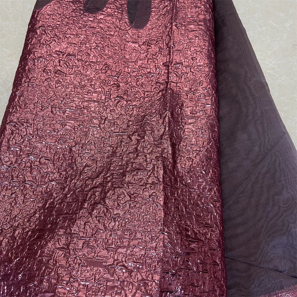 Luxury Nigerian Tulle Lace Fabric in embroidered organza, ideal for bridal gowns, showcasing exquisite craftsmanship.