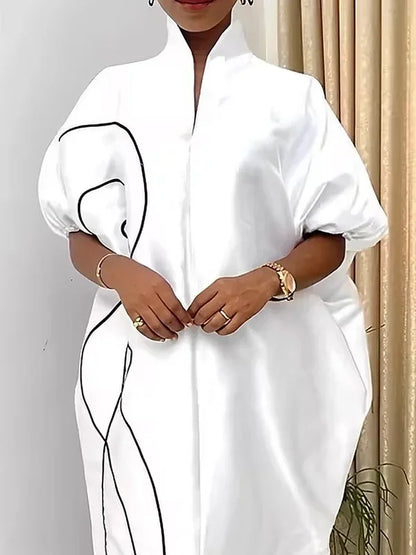 Luxurious Modigirl Plus Size Islamic dress featuring a loose fit design, tailored for comfort and style.