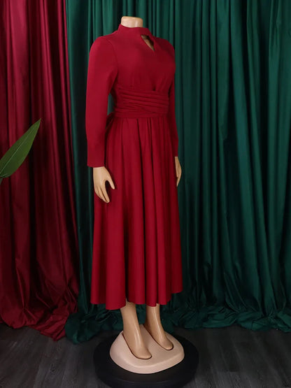 Close-up view of the intricate fabric of the Wmstar Plus Size Women's Dress, showcasing vibrant Ankara patterns for a luxurious feel.