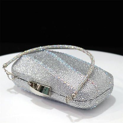 Fashionable women's rhinestone embellished black heels set against a chic background, embodying class and sophistication.