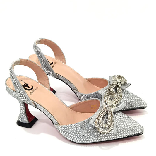 Luxury women's rhinestone bow party shoes with super high spike heels in mixed colours, crafted for elegance.