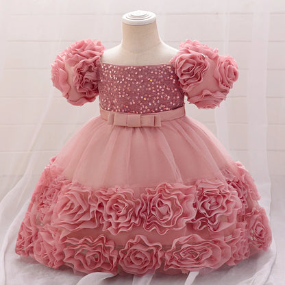 Beautiful floral appliqued knee-length gown for girls, showcasing a luxurious design suited for birthday celebrations.
