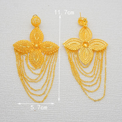 Glamorous Long Tassel Earrings with a trendy geometric motif in radiant gold, perfect statement jewellery for weddings and upscale gatherings.