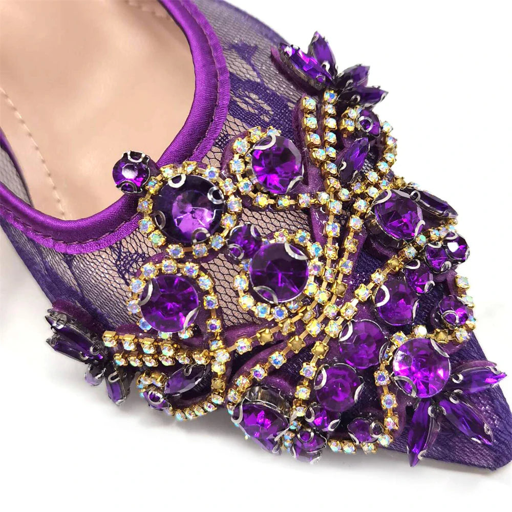 Close-up of intricate crystal detailing on elegant green lace low heel shoes, exuding sophistication.