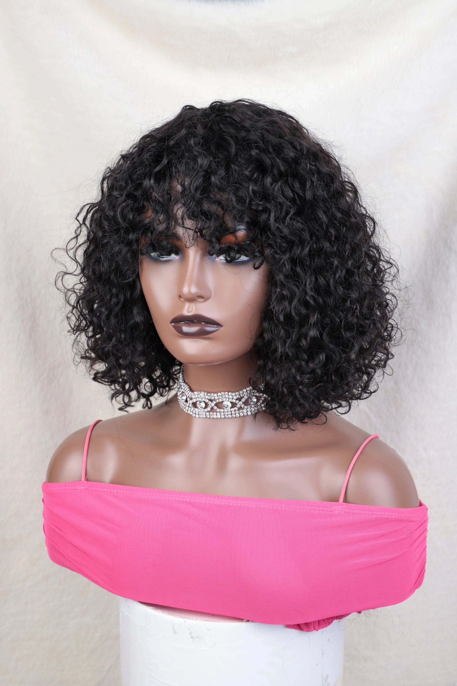 Lifestyle shot of the Short Pixie Bob Cut Wig with Bangs, showcasing a fashionable look ideal for any occasion, made from high-quality Peruvian hair.
