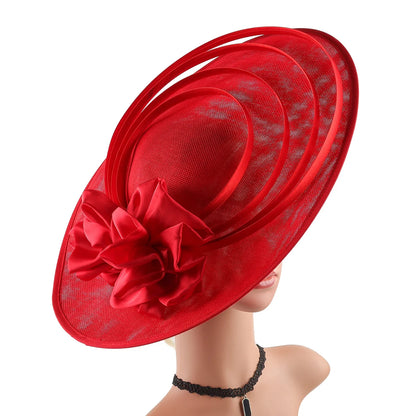 Sophisticated sinamay fascinator hat for ladies, perfect accessory for special events and garden parties, combining fashion and comfort.