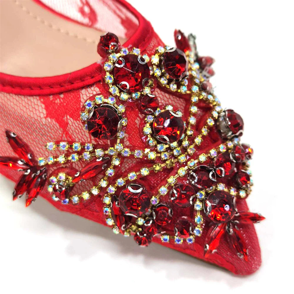 Close-up of the crystal detailing on luxurious green lace shoes, highlighting premium craftsmanship and fashion-forward design.