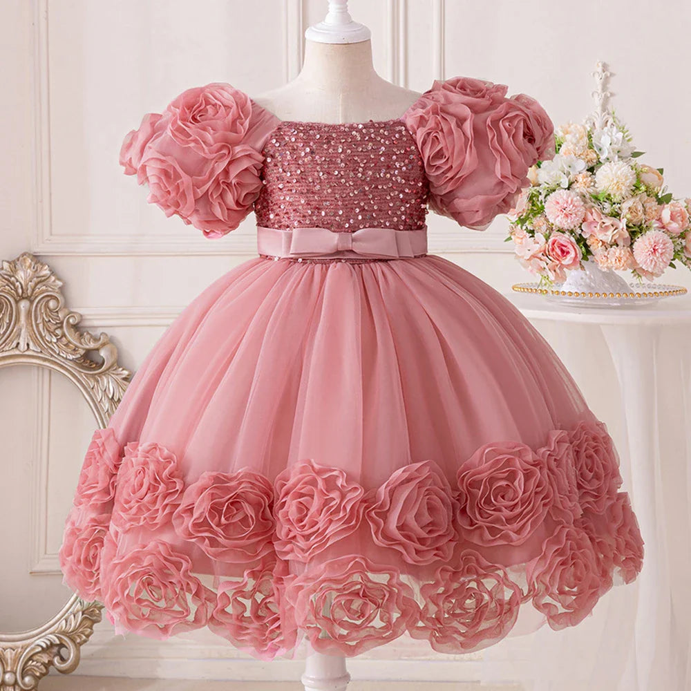 Chic knee-length ball gown for girls aged 4-10, showcasing exquisite floral appliques on soft tulle, ideal for special occasions and formal events.