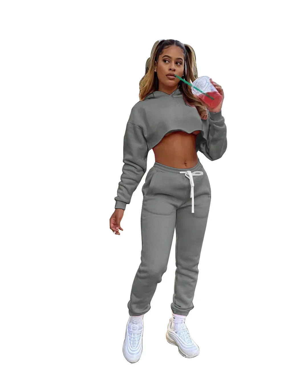 Alluring pink fleece running set for women, featuring a modern long sleeve cropped hoodie, perfect for stylish winter workouts.