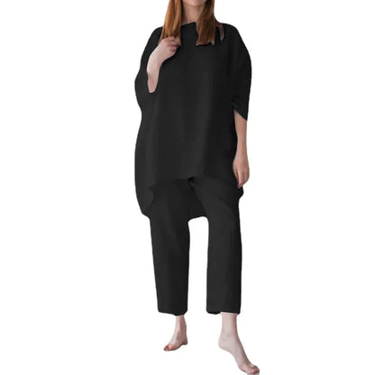 Fashionable women's blouse and trouser set showcasing a luxurious vintage office ensemble for the stylish professional.