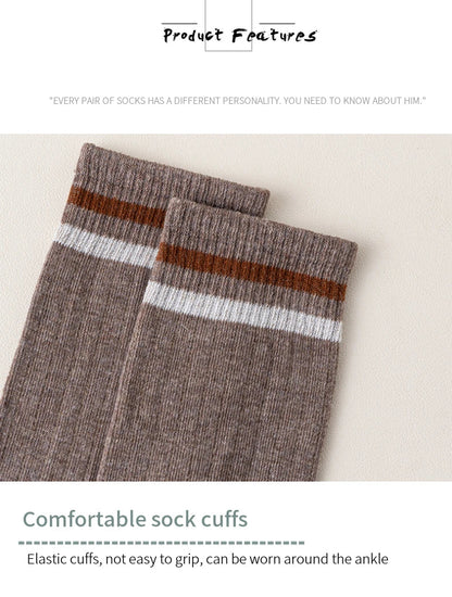 Luxurious men's winter sports socks, five stylish pairs featuring a blend of cotton, polyester, viscose, and spandex for ultimate comfort.