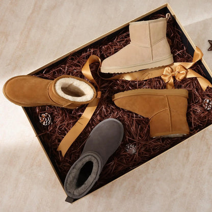 Detailed view of the square heel of women's plush suede ankle snow boots, combining elegance with practicality for winter fashion.