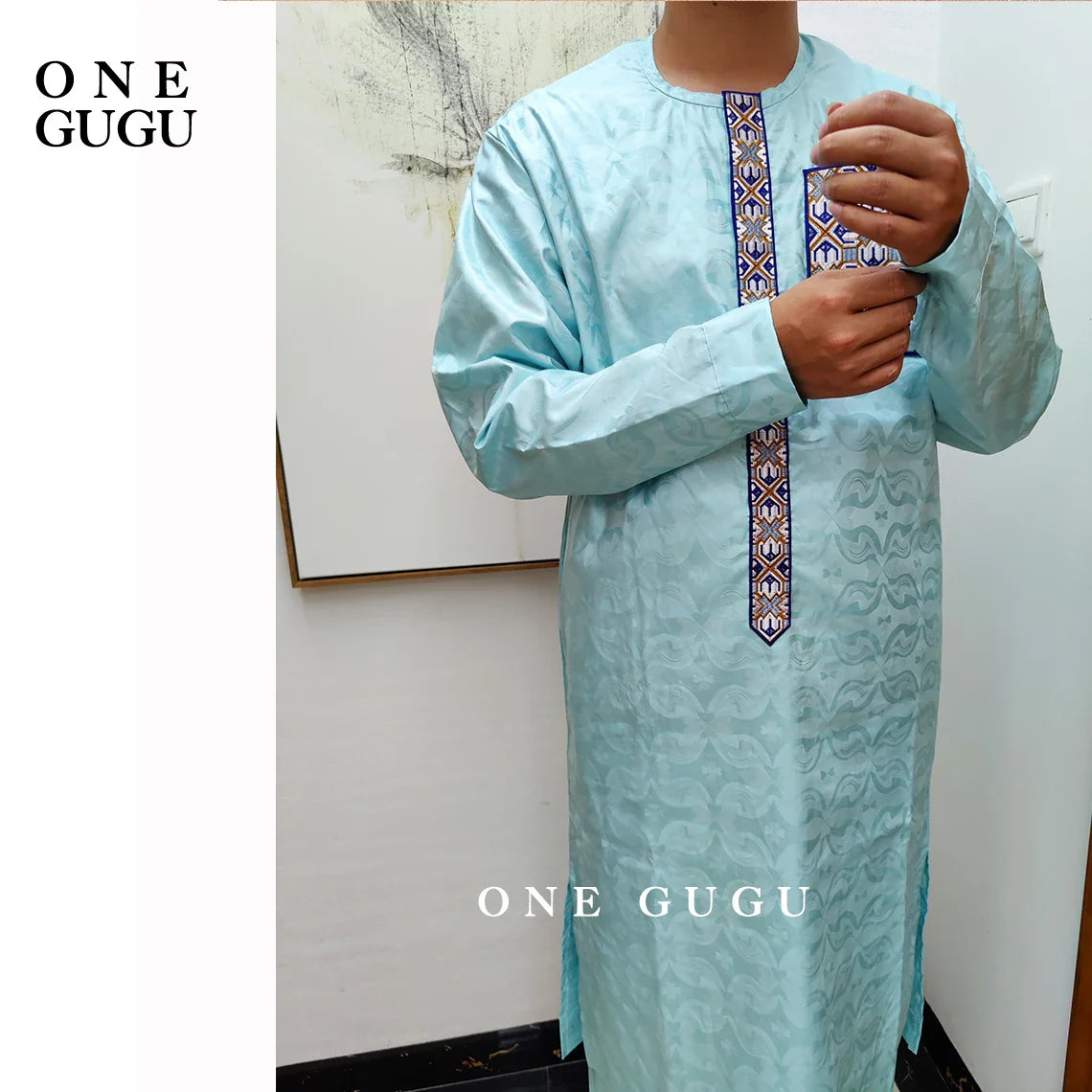 Close-up of the jacquard basin decoration on the blue cotton shirt of the premium 2-piece African men's set, epitomising luxury and tradition.