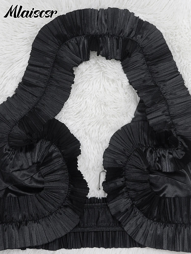 Luxurious Mlaiscsr women’s dress set displayed on a mannequin, featuring a sexy crop top and asymmetrical pleated skirt for a fashionable autumn look.