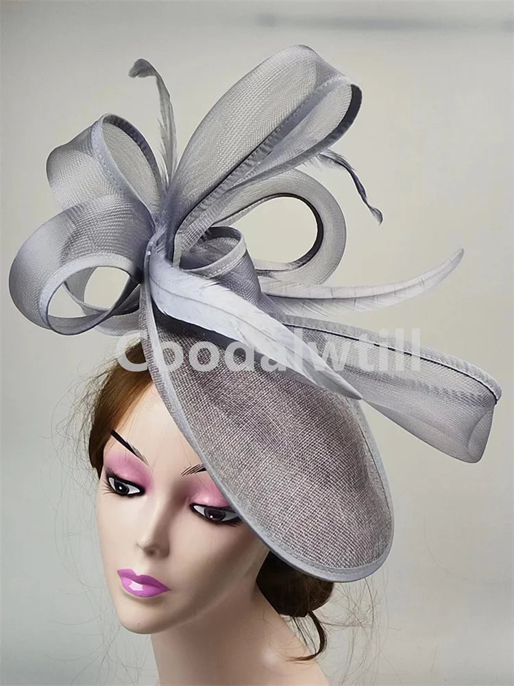 Sophisticated grey fascinator pillbox cap for women, featuring a timeless design suited for upscale events and weddings.