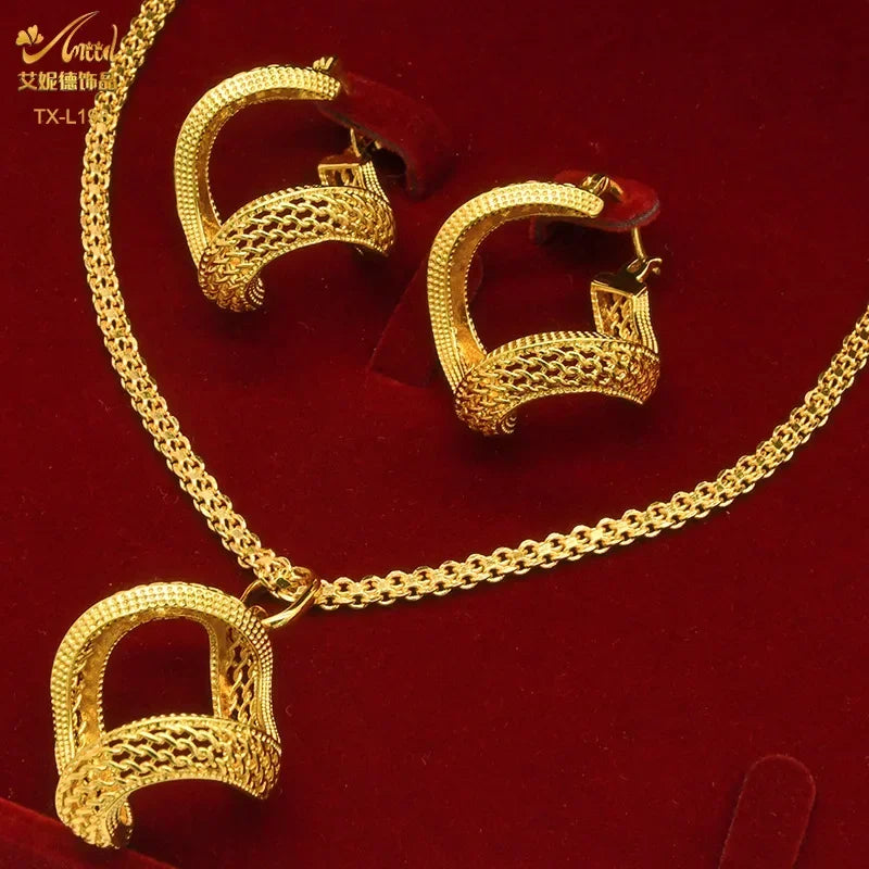 Stylish 24K gold-plated copper jewelry set displayed on an elegant background, suitable for modern women seeking luxury.