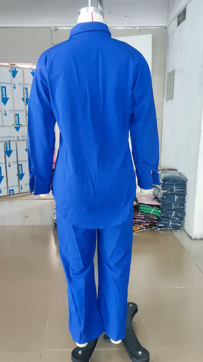 Sophisticated luxury women's outfit set showcasing the fine laminated fabric and relaxed fit.