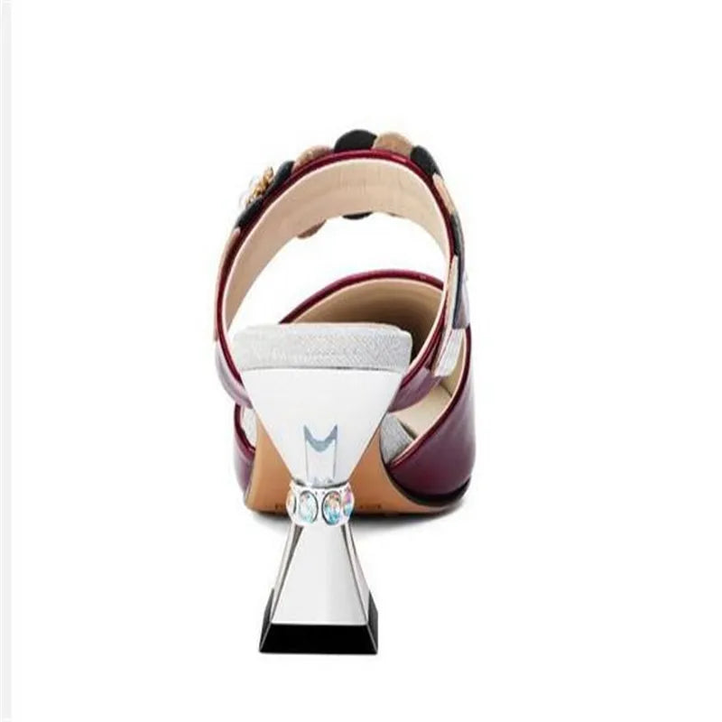 Stylish rhinestone slides with a plush fur upper, designed for a luxurious look and feel.