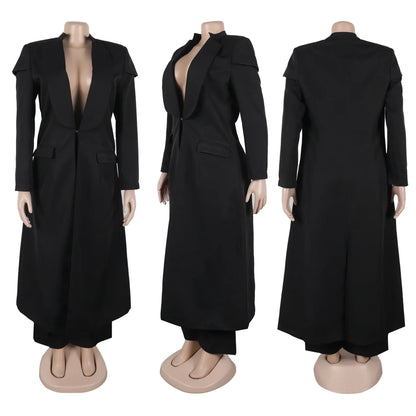 Polished and classic women's x-long blazer with pockets, accompanied by flattering wide leg pants, embodying luxury and elegance for any office setting.