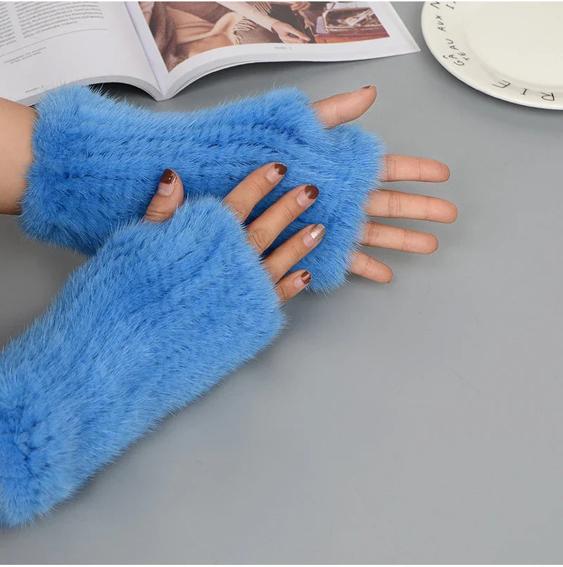 Elegant knitted fur gloves for women, featuring a chic design and soft mink texture, ideal for a warm winter look.