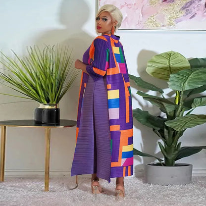 Stylish model wearing the Elegant African Plus Size O-Neck Pleated Dress, capturing the essence of traditional African fashion in contemporary styling.