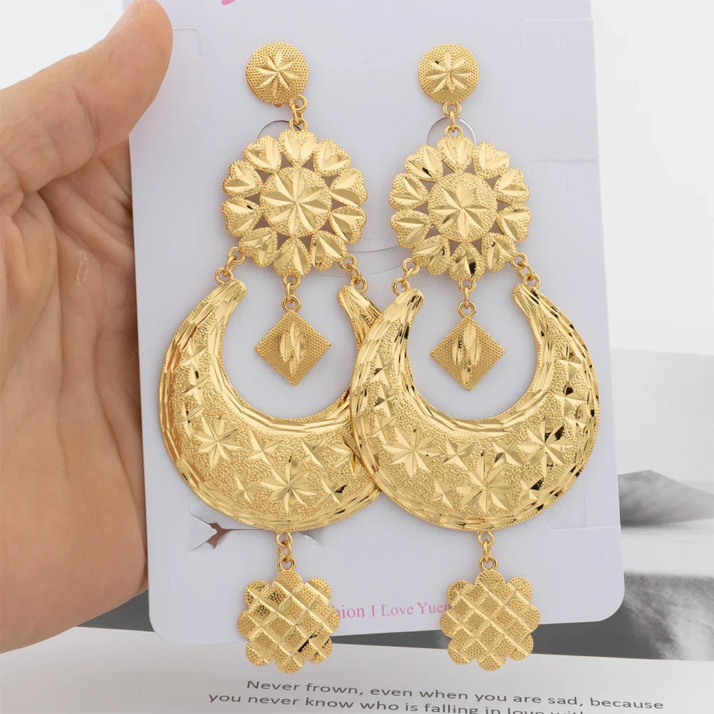 Elegant 18K gold plated drop earrings featuring a large copper tassel, perfect for enhancing your wedding attire or everyday elegance.