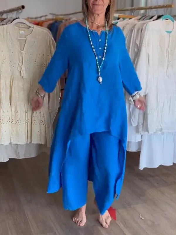 Elegant plus size women's casual linen two piece set featuring a vintage long blouse and wide leg pants, ideal for relaxed summer days.