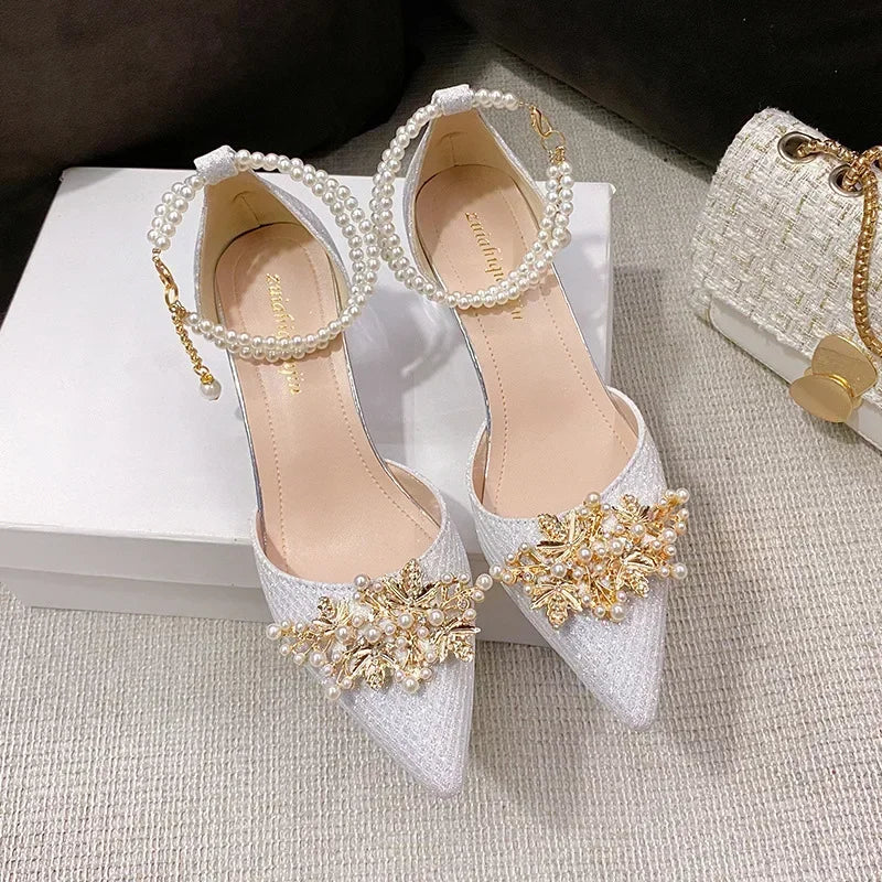 Elegant luxury women's high heels featuring a pointed toe and exquisite metal beaded design, perfect for summer weddings.