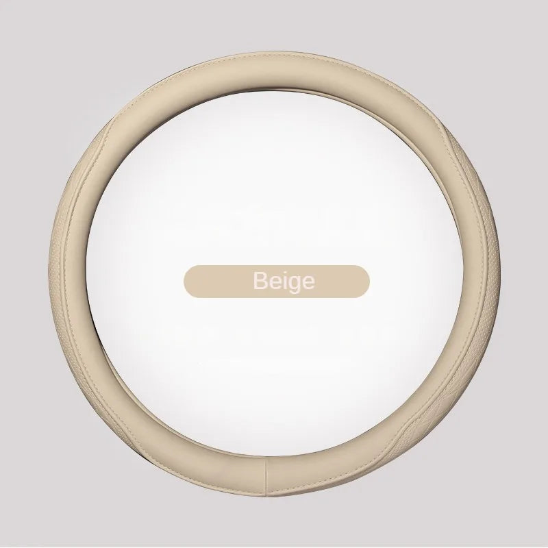 Sophisticated Napa leather perforated patchwork steering wheel cover, designed for a universal fit, merging style and functionality for an enhanced automotive aesthetic.