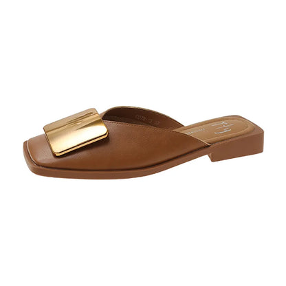 Summer fashion women's slippers with a flat heel and fashionable shallow cut, accentuating sophistication.