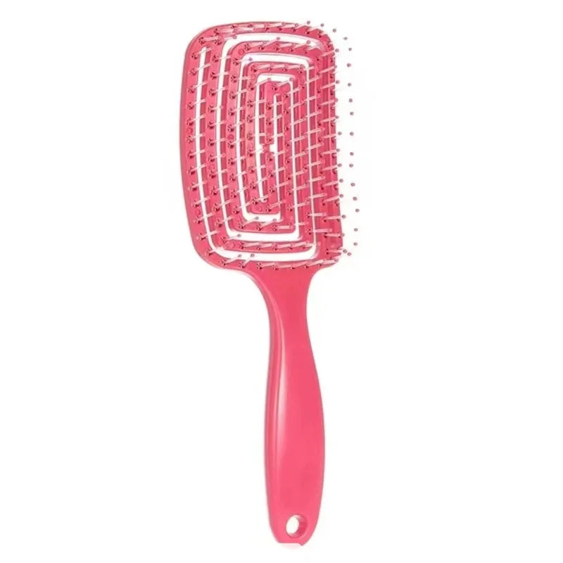 Sleek plastic massage comb crafted for fast detangling, featuring a stylish hollow-out design for luxury appeal.