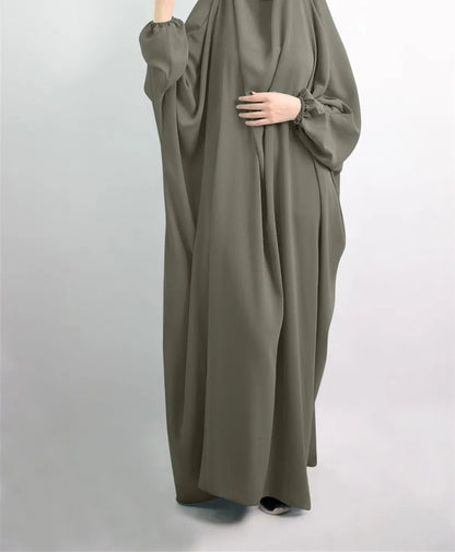 Refined polyester abaya dress for women, designed for a flattering fit that enhances feminine grace, suitable for both casual outings and special occasions.