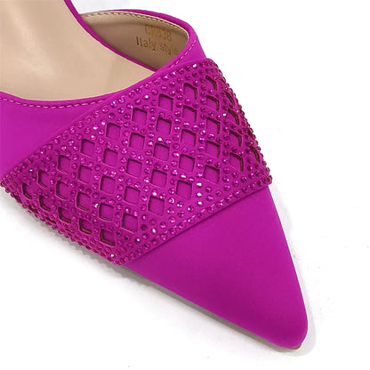 Chic wine colour handbag set accompanying the elegant Nigerian women's heeled shoes, featuring a luxurious metal handle and intricate rhinestone detailing, ideal for special occasions.