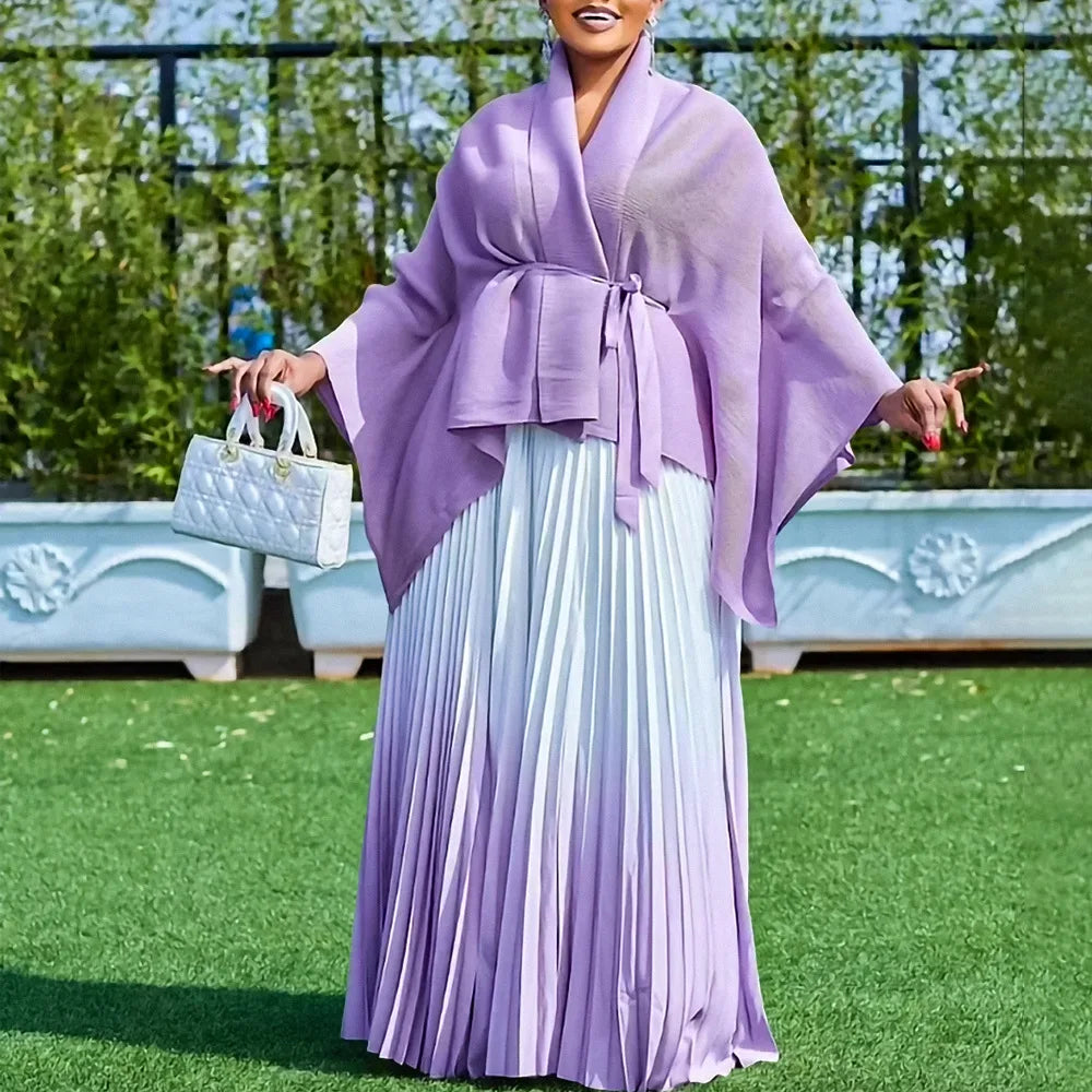 Full view of the Luxury Dashiki 2 Piece women's traditional outfit with flowing skirt and chic V-neck top, designed for comfort and style on special occasions.